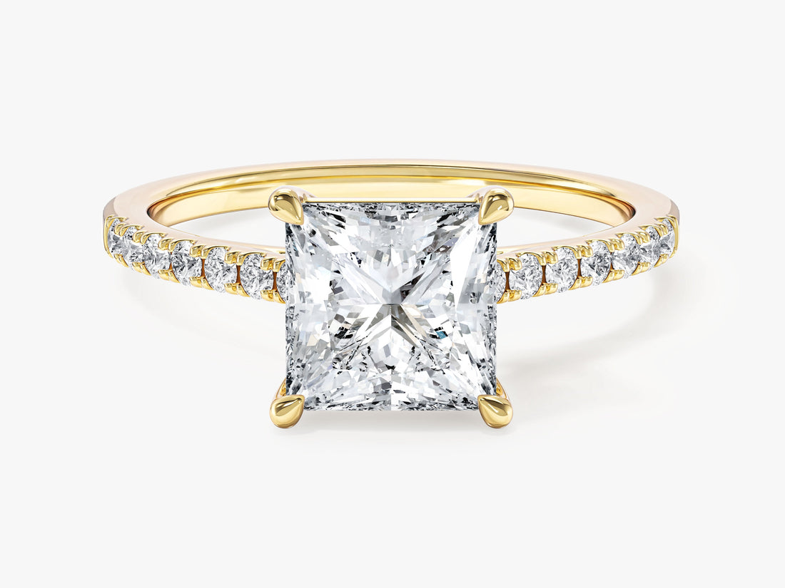 Princess cut lab grown diamond four claw engagement ring with micro pave shoulders in yellow gold