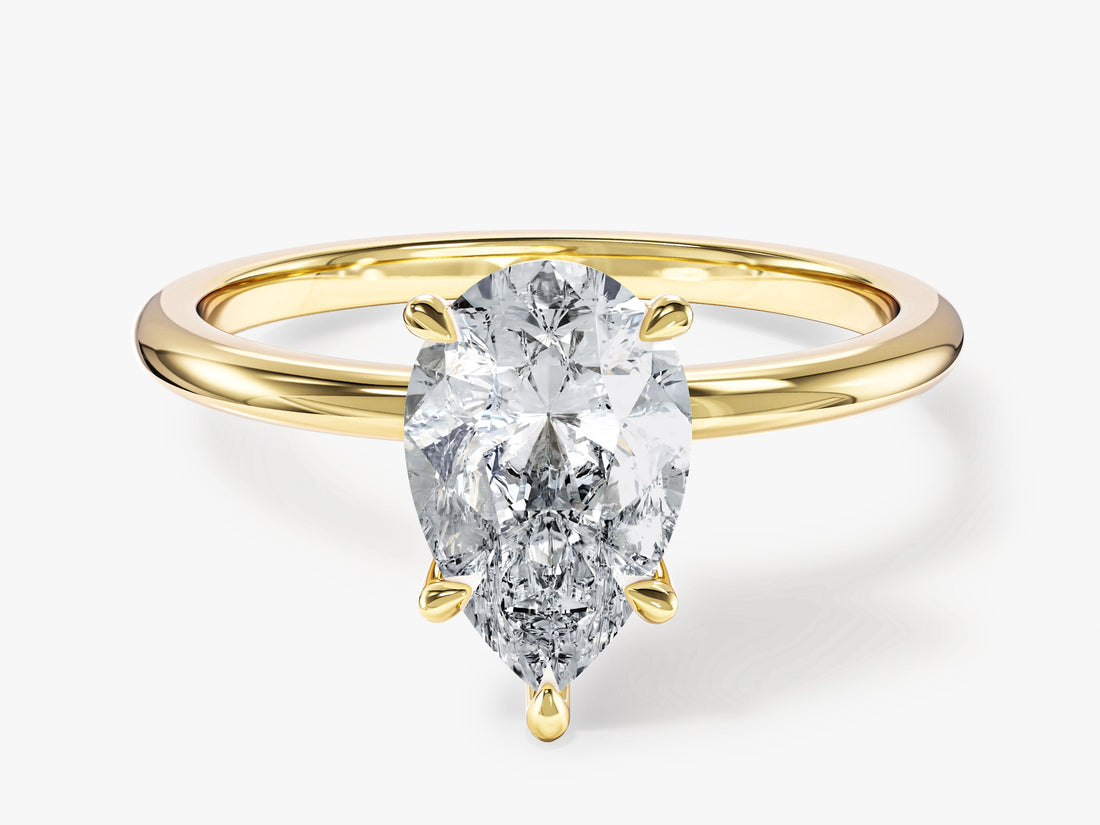 Pear shaped lab grown diamond teardrop solitaire in yellow gold, front view
