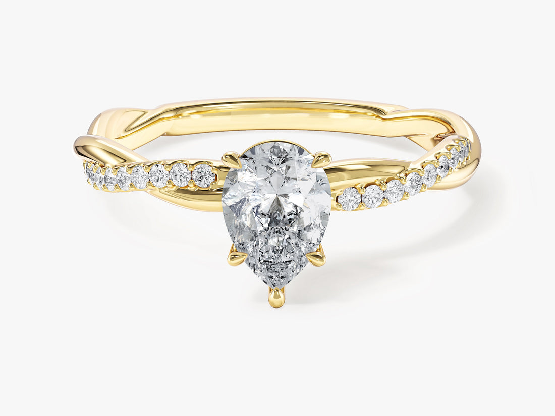 Dainty pear cut lab grown diamond braided rope engagement ring in yellow gold, front view