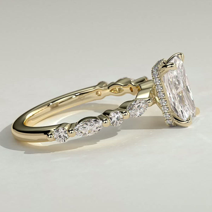 Radiant cut moissanite engagement ring with alternating marquise and round accents in yellow gold, view 2
