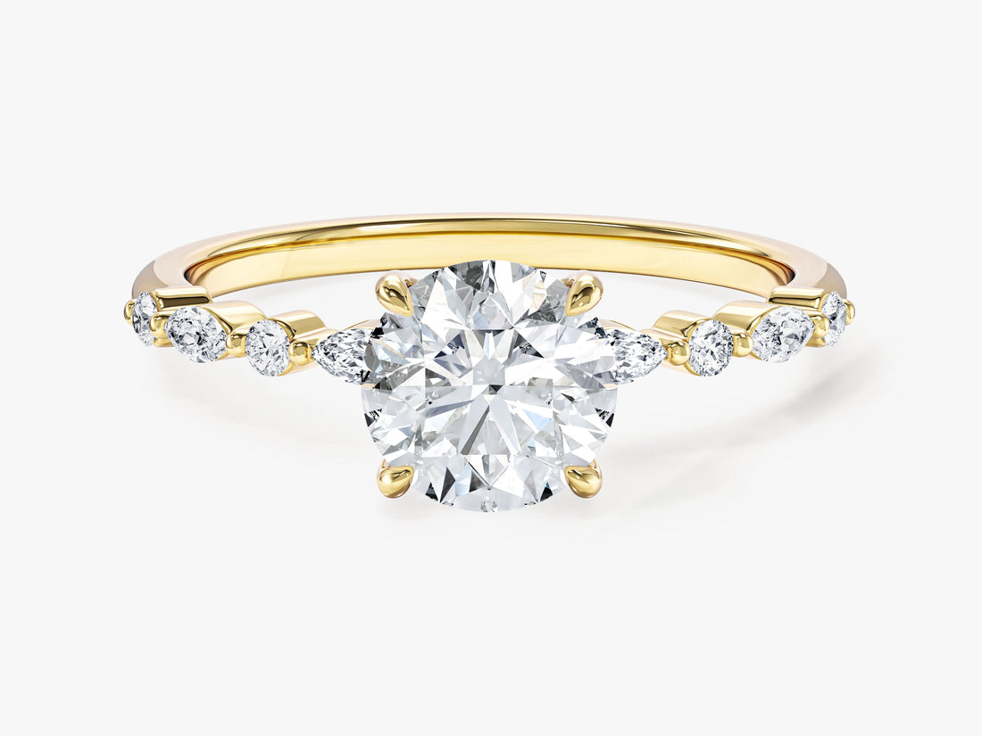 Round moissanite engagement ring with alternating marquise and round side stones in 14K yellow gold, front view