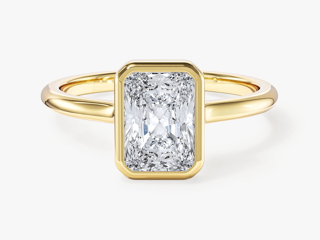 Rectangle radiant moissanite bezel solitaire engagement ring in yellow gold, front view