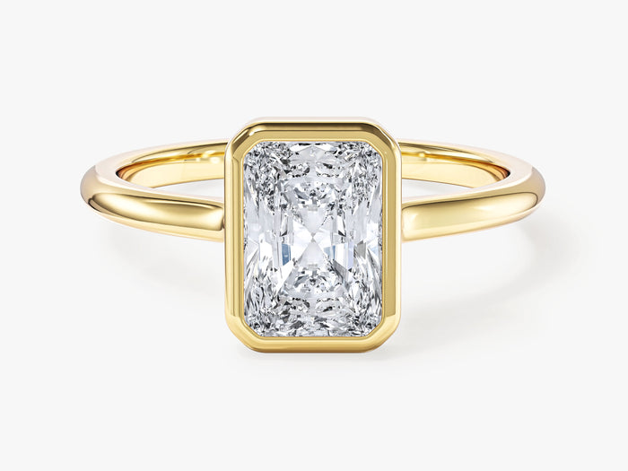 Rectangle radiant moissanite bezel solitaire engagement ring in yellow gold, front view