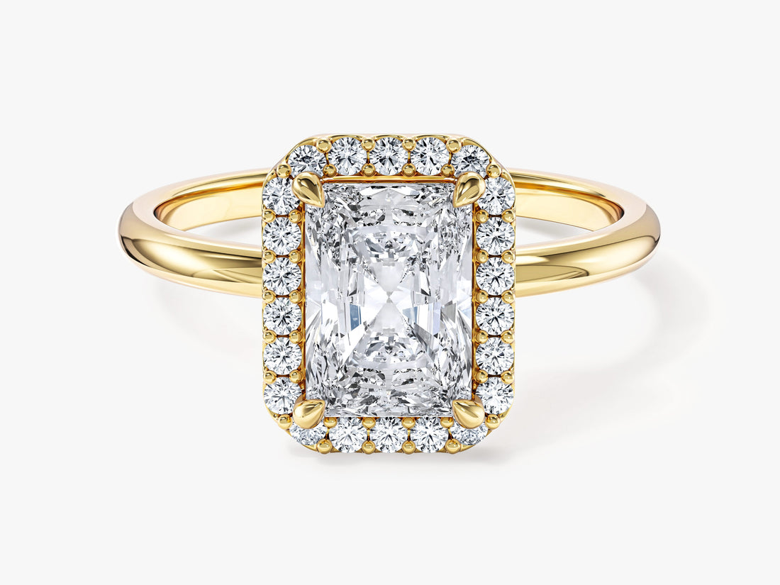 Rectangle radiant moissanite micro prong halo engagement ring in yellow gold, front view
