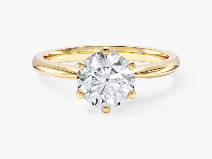 Round moissanite six claw hidden halo engagement ring with tapered band in yellow gold, front view