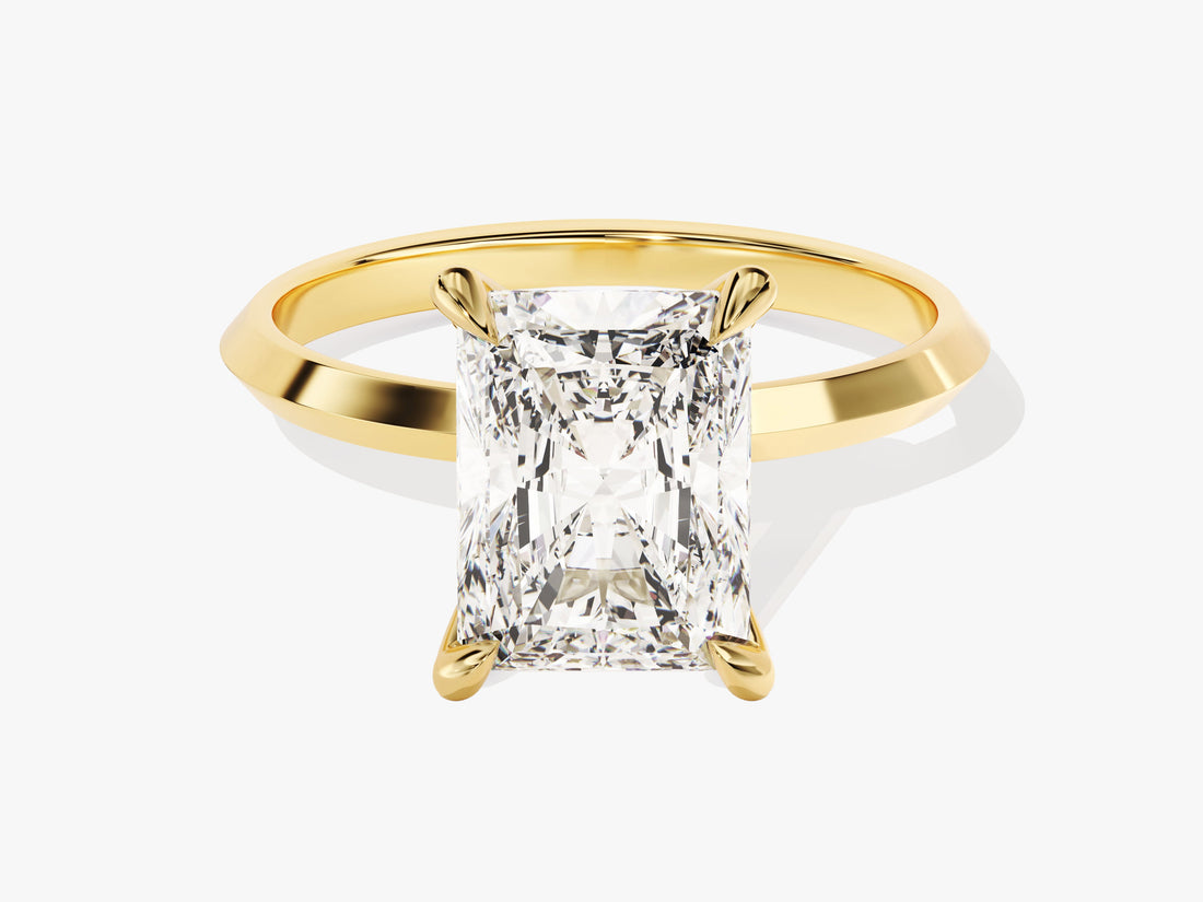 Large radiant moissanite knife edge statement engagement ring with talon claws in 14K yellow gold