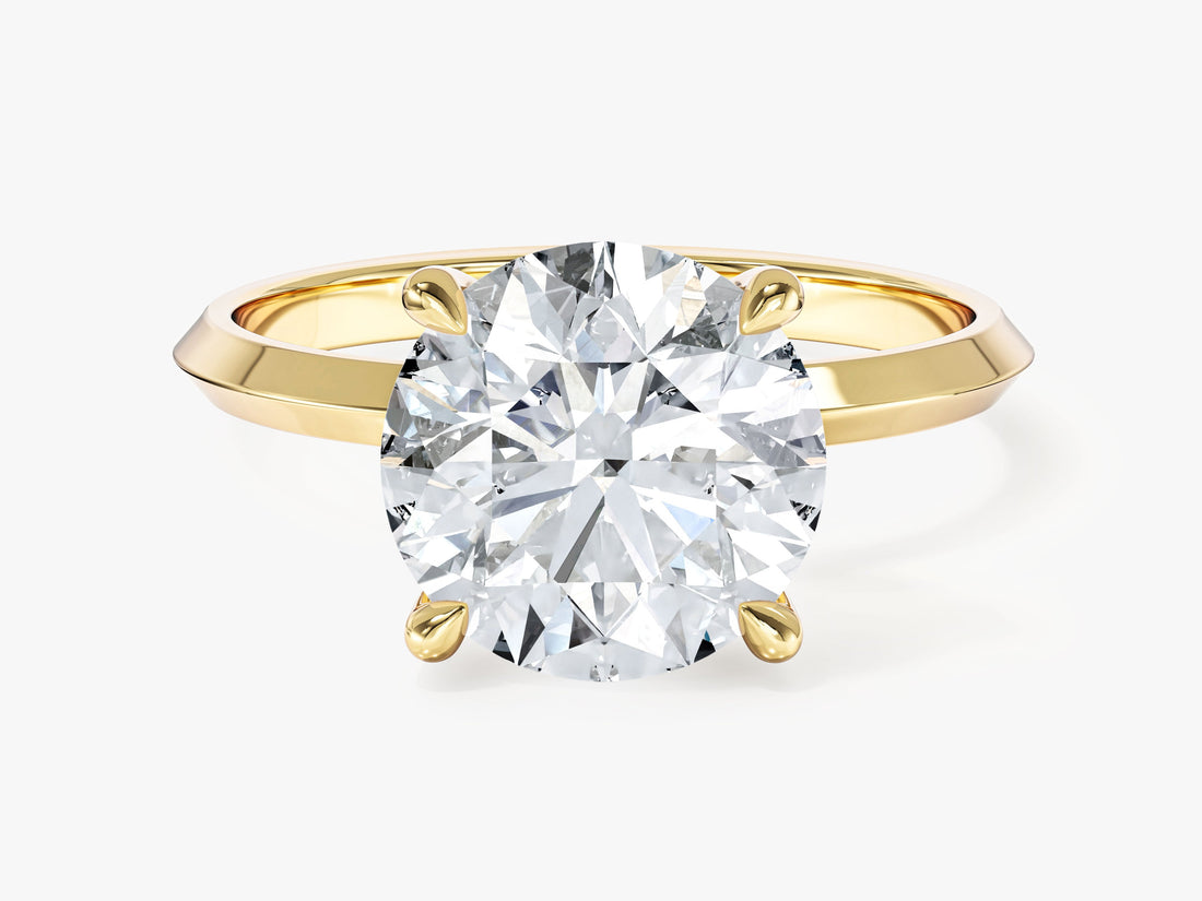 Round lab grown diamond high set knife edge solitaire in yellow gold, front view