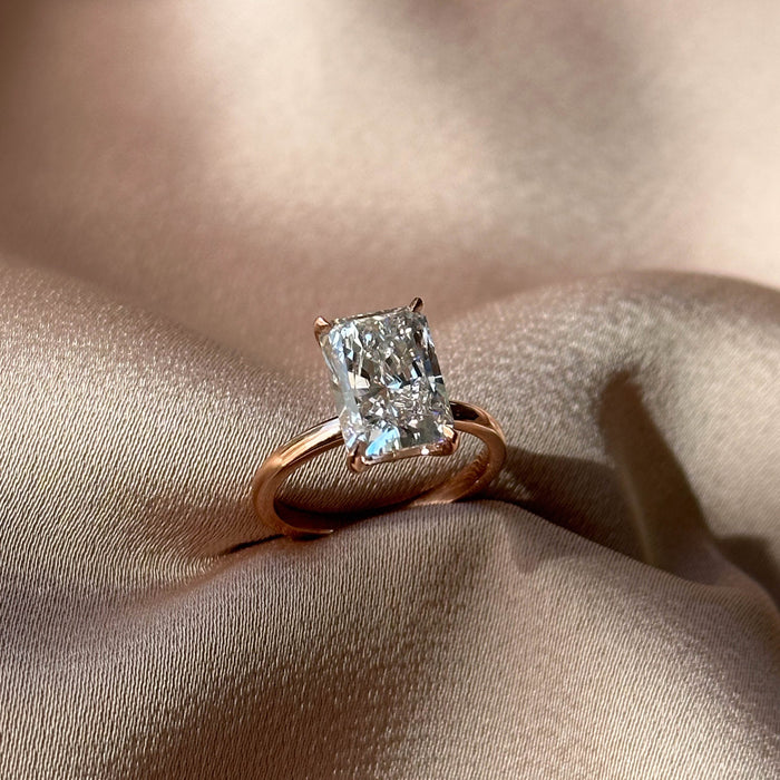 Radiant cut moissanite plain band solitaire engagement ring in rose gold, view 2