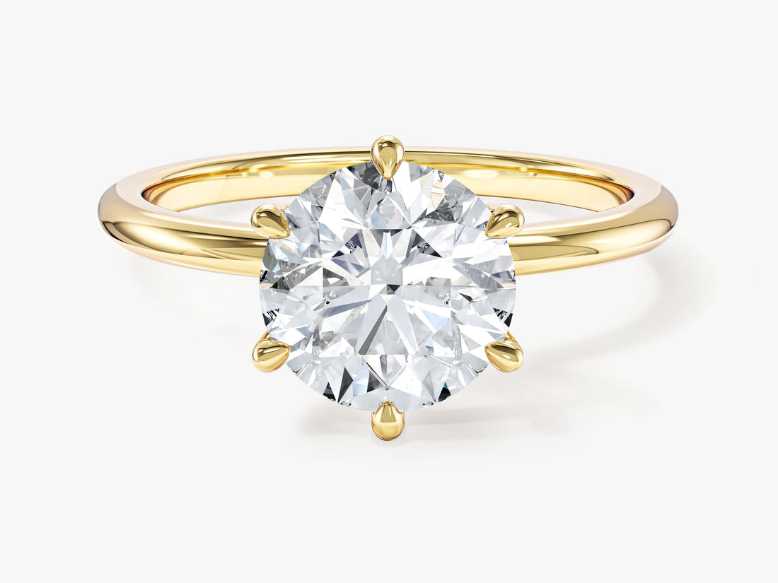 Round lab grown diamond high set six prong solitaire in yellow gold, front view