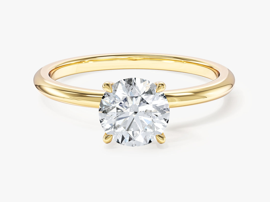 Round lab grown diamond classic solitaire with rounded comfort band in yellow gold, front view