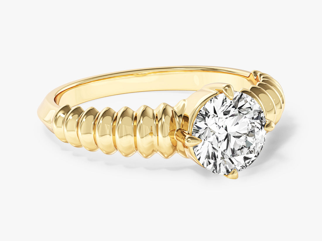 Round moissanite solitaire engagement ring with ribbed dome shoulders in 14K yellow gold, angled view