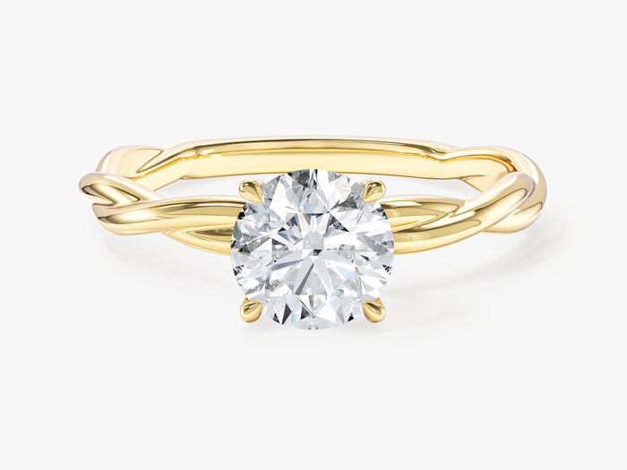 Round moissanite solitaire engagement ring with twisted rope band in 14K yellow gold, front view