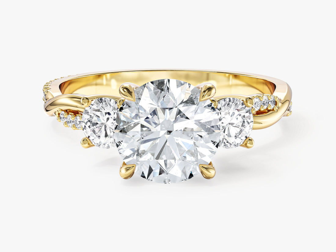 Round moissanite three stone engagement ring with twisted vine pave band in yellow gold, front view
