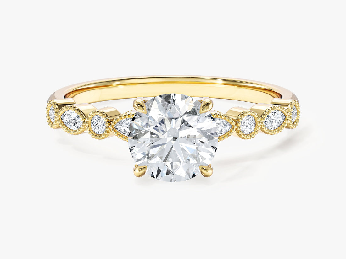 Round moissanite vintage milgrain engagement ring with marquise and round side stones in yellow gold, front view