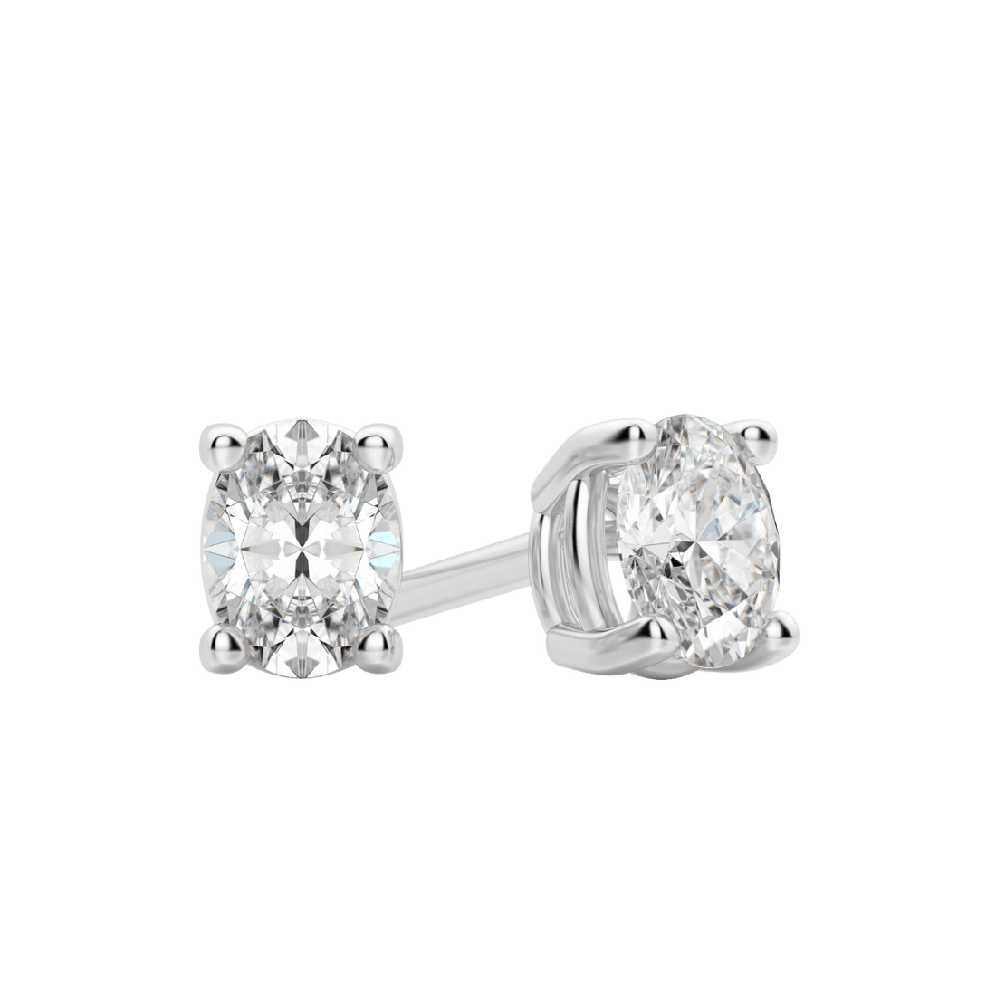 Pair of white gold oval lab grown diamond stud earrings in four prong settings