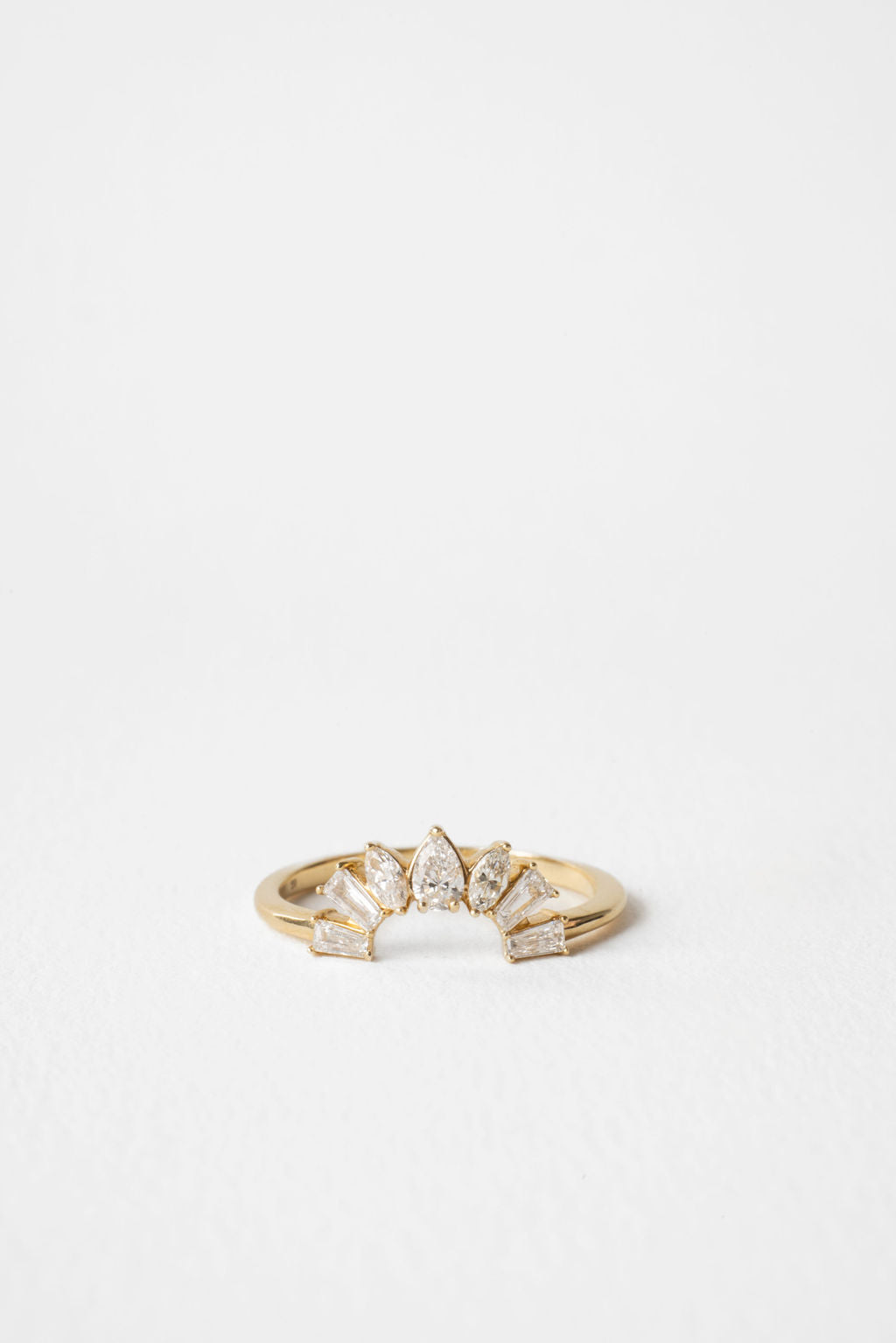 Pear, marquise and tapered baguette lab grown diamond curved fan wedding band 0.50 CT TW in yellow gold, front view
