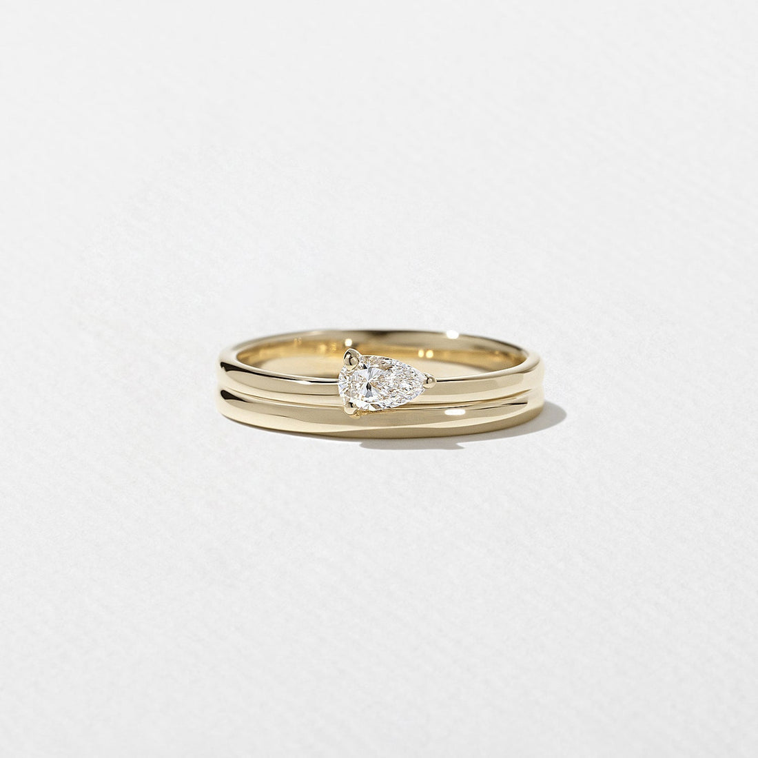 Pear lab grown diamond single stone wedding band in yellow gold front view