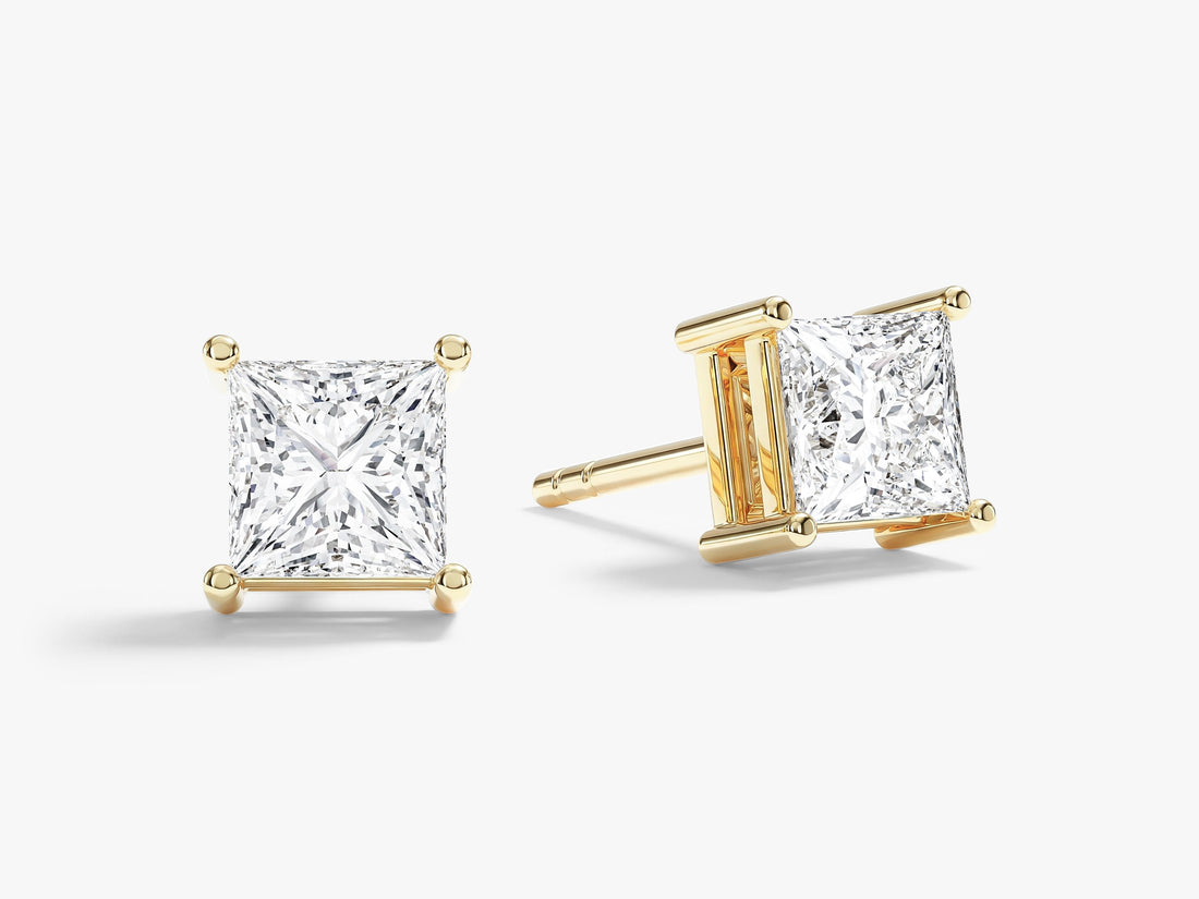 Pair of princess timeless 4 prong solitaire lab grown diamond stud earrings in yellow gold, E color VVS2 lab grown diamonds