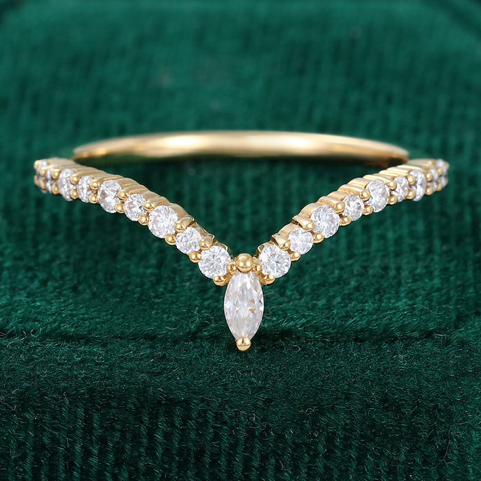 Round and Marquise moissanite marquise drop v curved wedding band, front view in yellow gold