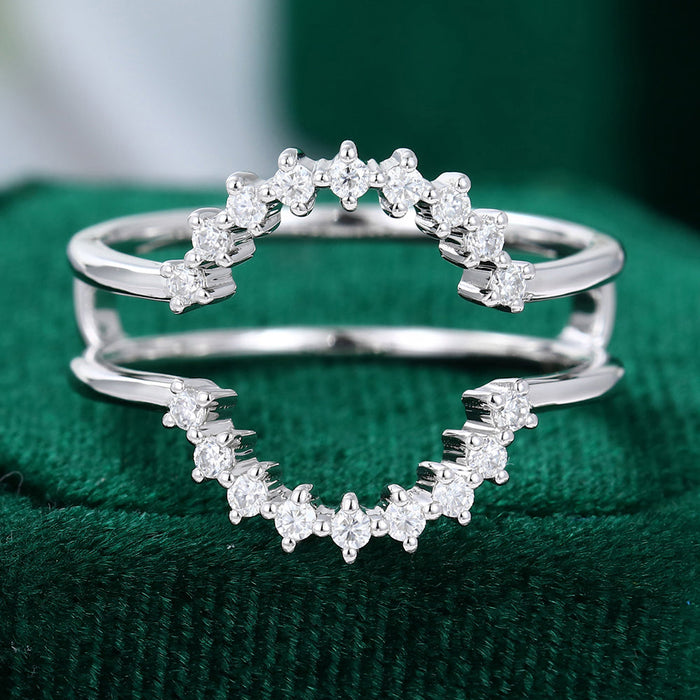 Round moissanite double curved prong wedding band, front view in white gold