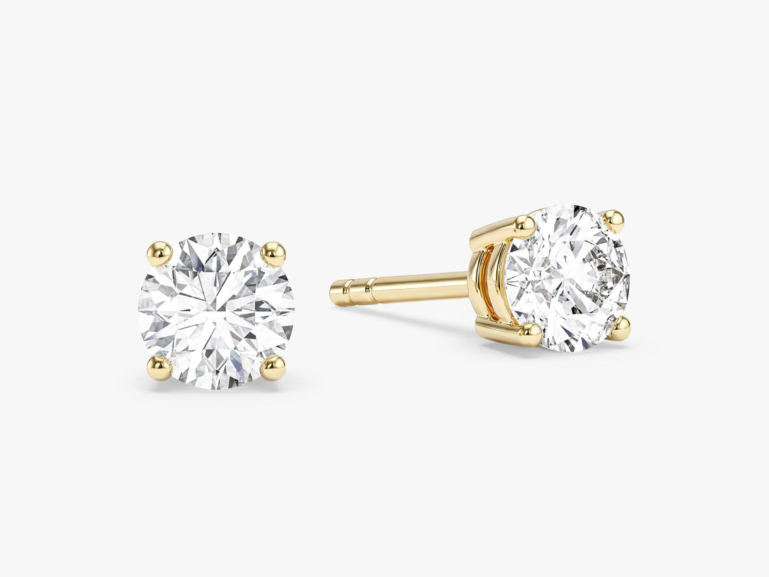 Pair of round essential 4 prong solitaire lab grown diamond stud earrings in yellow gold, E color VVS2 lab grown diamonds