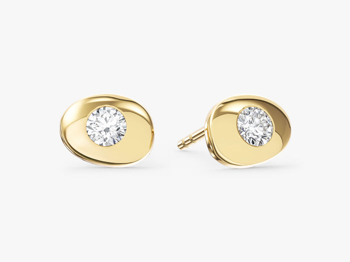 Pair of round flush set oval disc lab grown diamond stud earrings in yellow gold, E color VVS2 lab grown diamonds