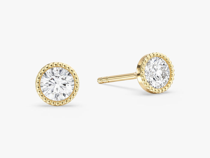 Pair of round milgrain bezel solitaire lab grown diamond stud earrings in yellow gold, E color VVS2 lab grown diamonds