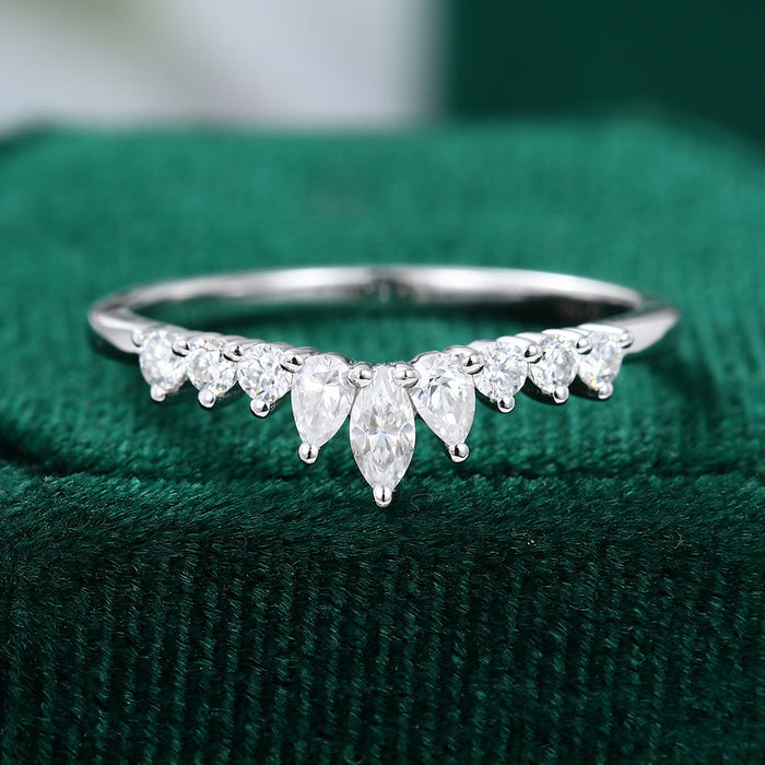 Round, Pear and Marquise moissanite graduated crown curved half eternity wedding band, front view in white gold