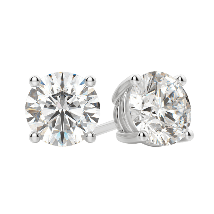 Close up of a pair of white gold four prong round lab grown diamond stud earrings