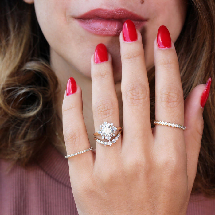 Snowflake halo engagement ring with a contoured wedding band